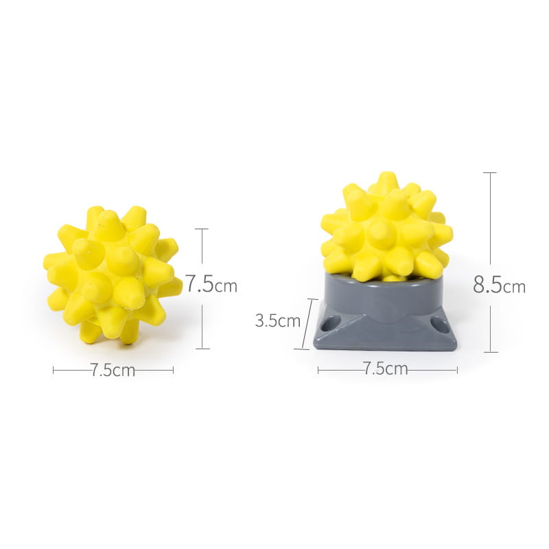 Yellow spiky Hedgehog Massage Ball on gray base