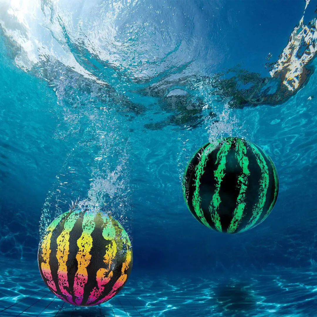 Two watermelon pool balls, rainbow stripes and green black, underwater