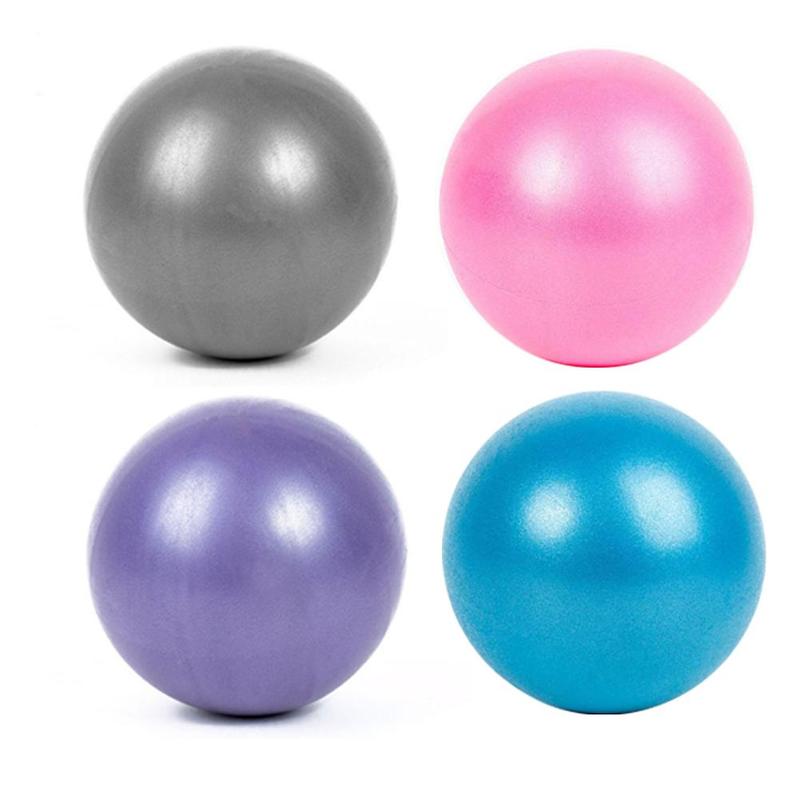 Four glossy Scrub Yoga Pilates Balls in gray, pink, purple, teal