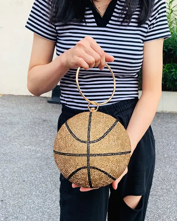 Golden rhinestone basketball clutch bag with black beading and hoop handle