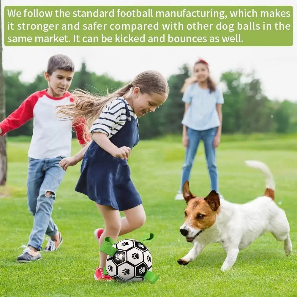 Interactive dog ball: black and white soccer ball with green paw print straps
