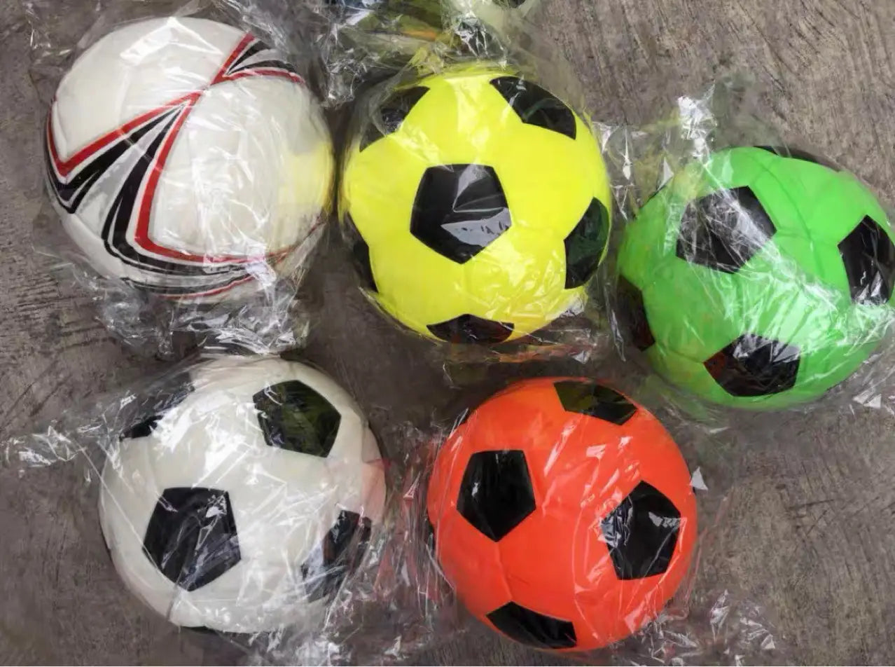 Bright yellow childrens indoor soccer ball with black pentagonal panels