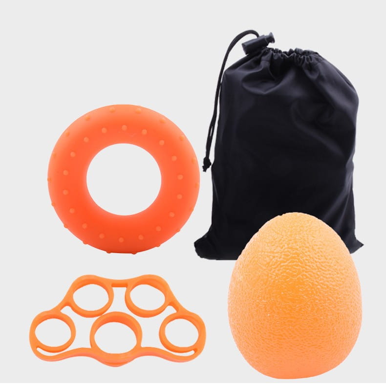 Orange Egg Ball Silicone Grip Ring set with textured grip and black drawstring bag