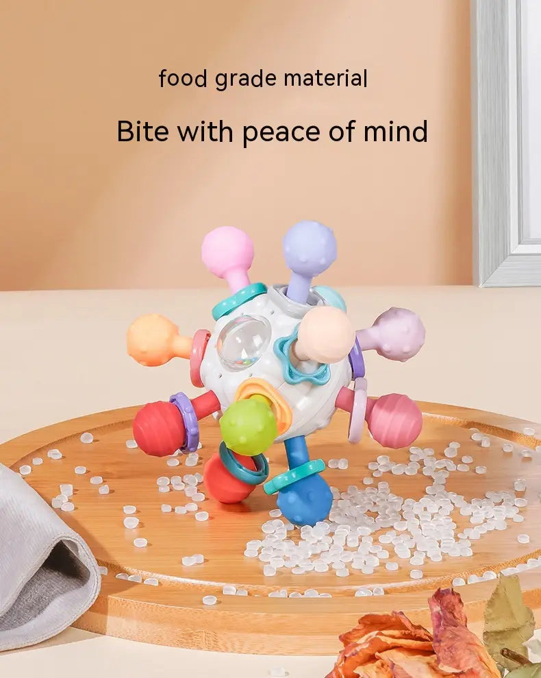 Baby Manhattan multicolored soft teething ball with protrusions and clear window