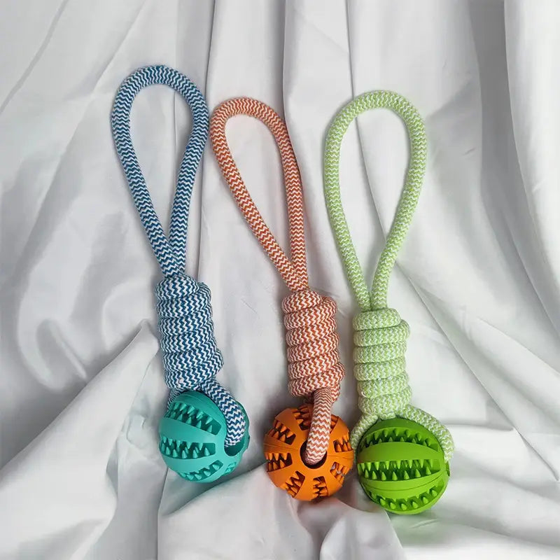 Three colorful braided rope dog toys with textured rubber balls, Interactive Dog Treat Rope Ball