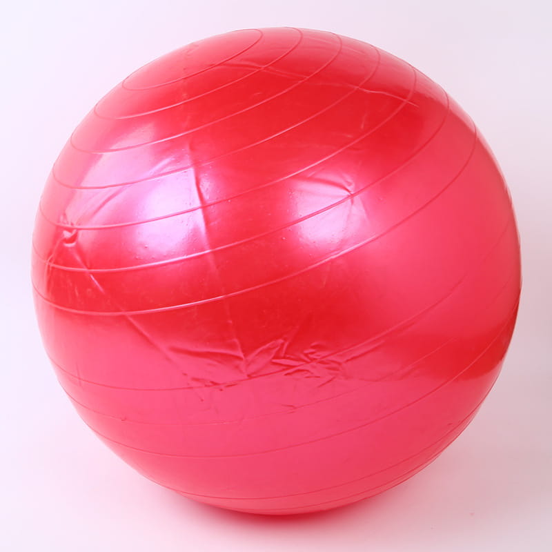 Vibrant red Fitness Yoga Ball with glossy surface and ridges
