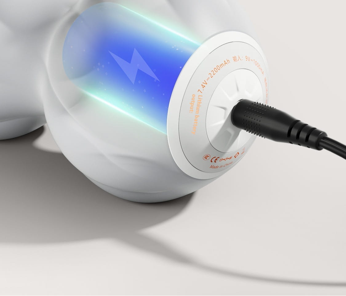 White glossy power bank with blue lightning bolt on Electric Deep Massage Yoga Ball