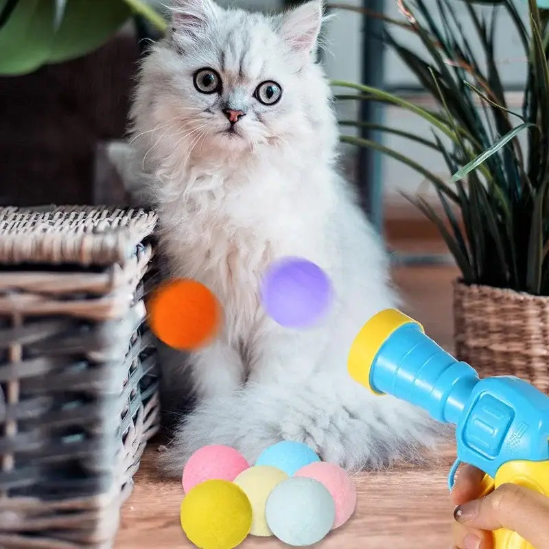 Blue and yellow Interactive Cat Toy Shooting Ball Launcher with foam balls