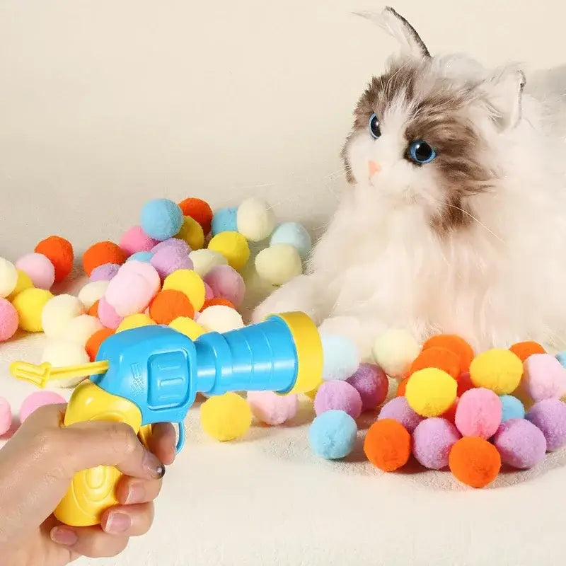 Blue yellow plastic toy gun launcher for Interactive Cat Toy Shooting Ball pom-poms