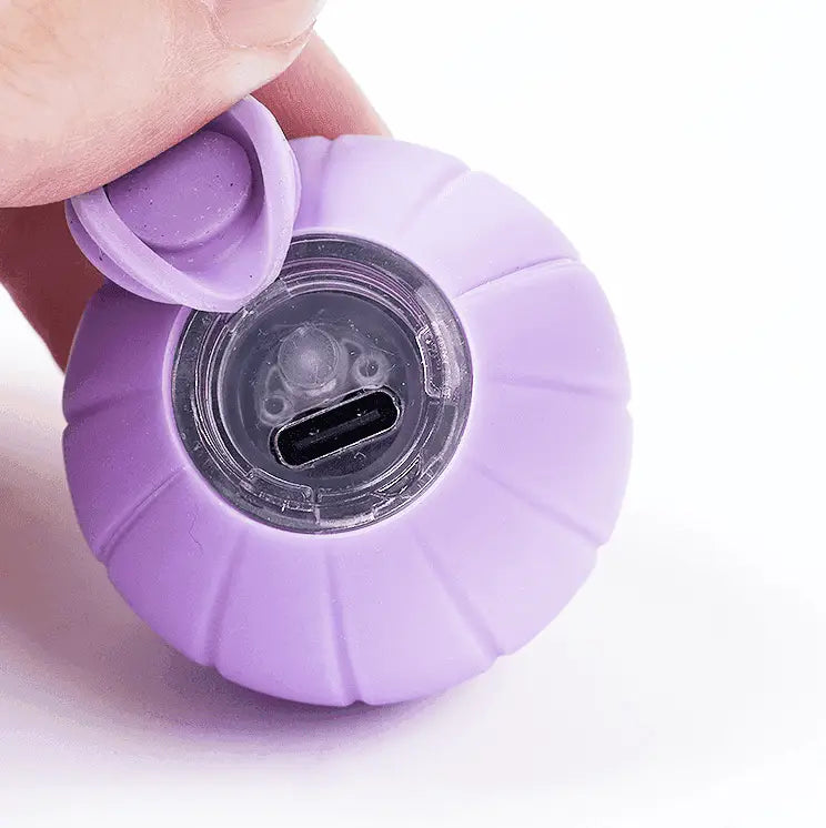 Orange Cat Bounce Ball appareil en silicone violet avec port USB-C