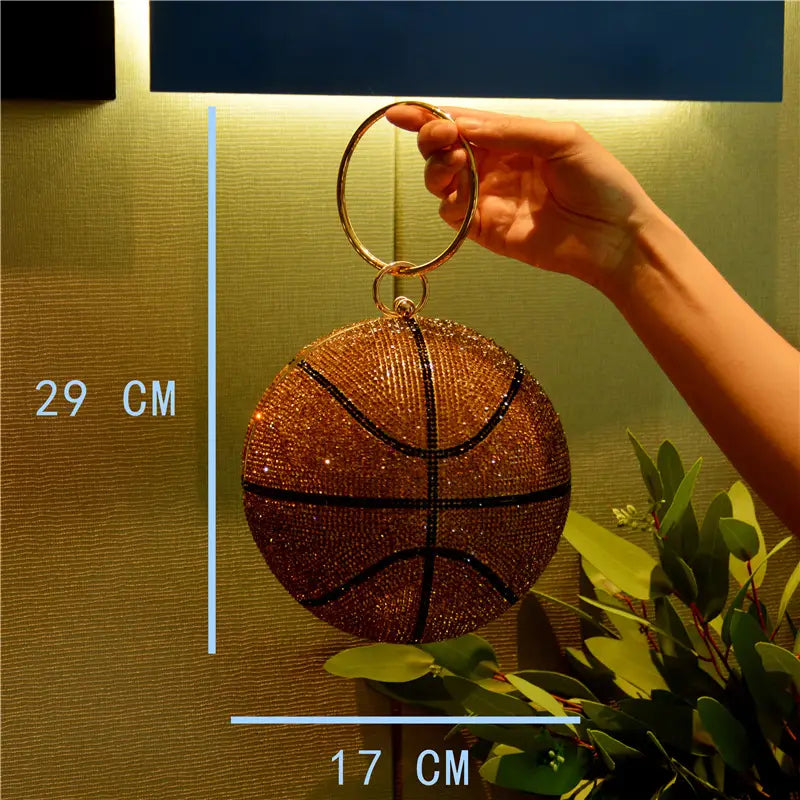 Sparkling gold rhinestone basketball clutch bag with black stitches