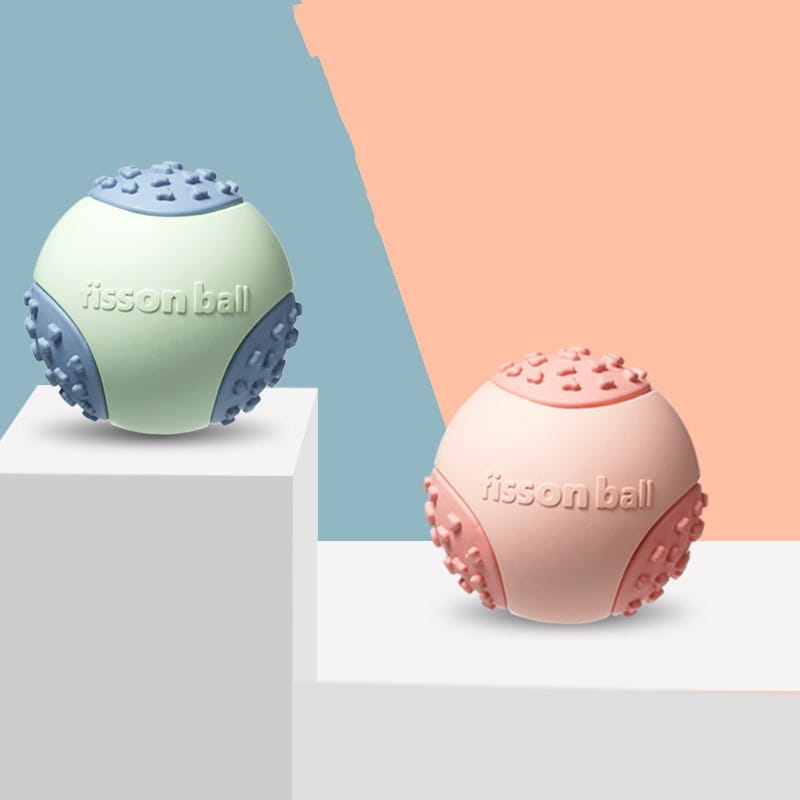 Pastel green/blue or pink/peach bumpy rubber dog toy ball