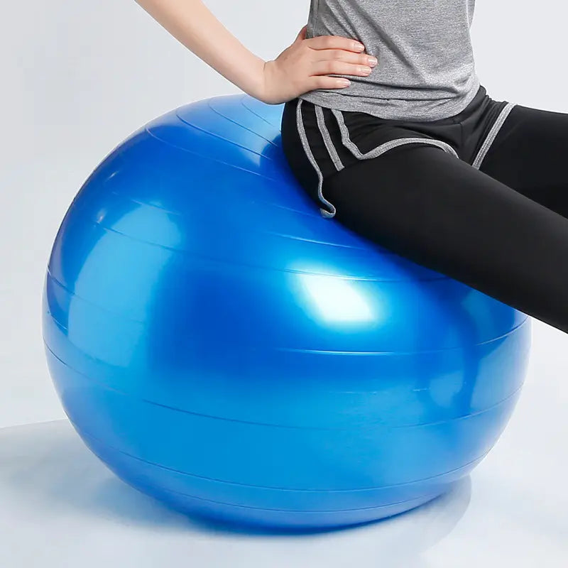Vibrant blue Fitness Yoga Ball with glossy surface and ridges