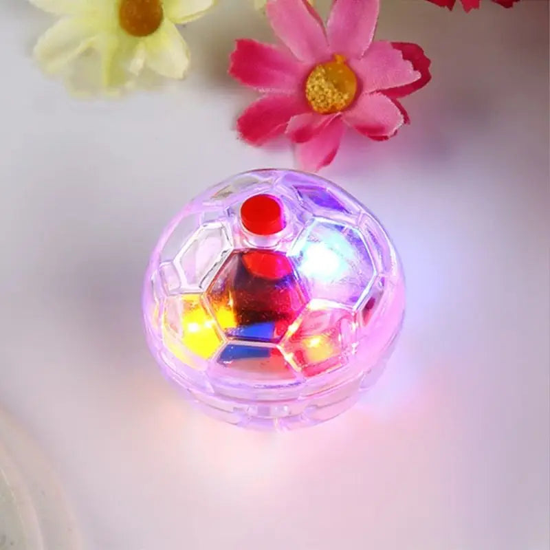 Clear Illuminating Cat Ball: translucent purple toy with red button and colorful LED lights