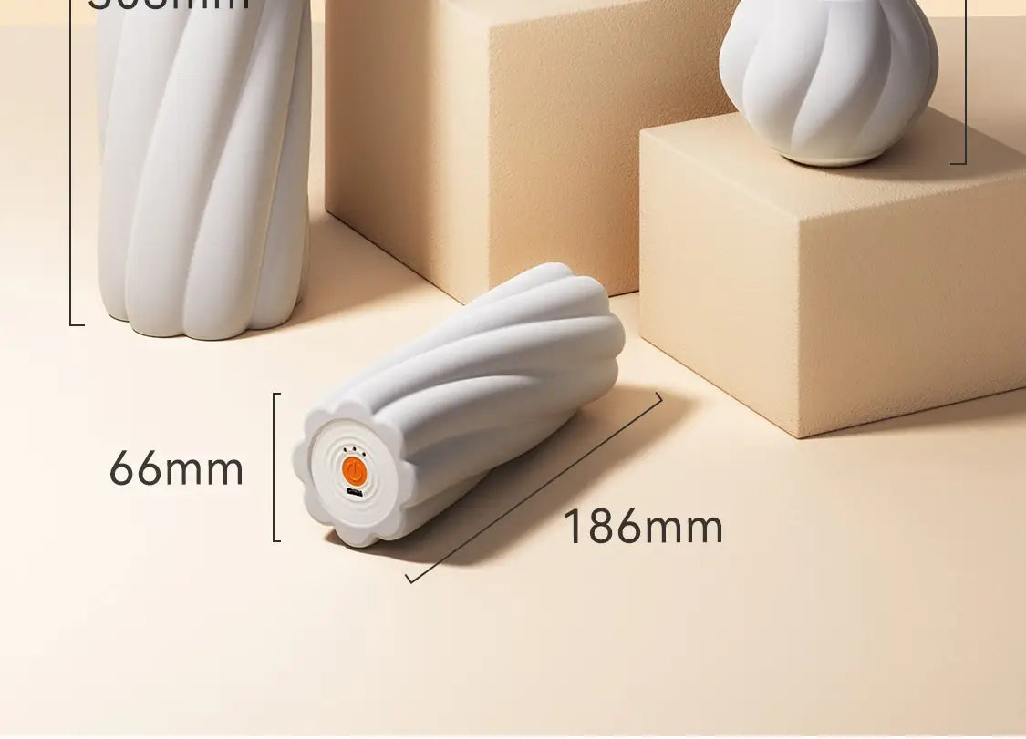 White textured foam roller with orange control panel for Electric Deep Massage Yoga Ball