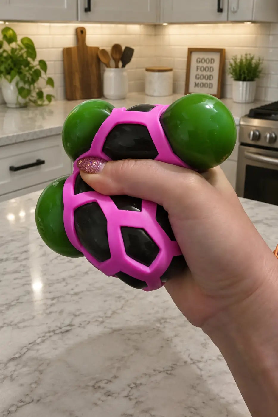 Puka Creations bounce ball: Color Changing Hex-Mesh Squeeze Ball