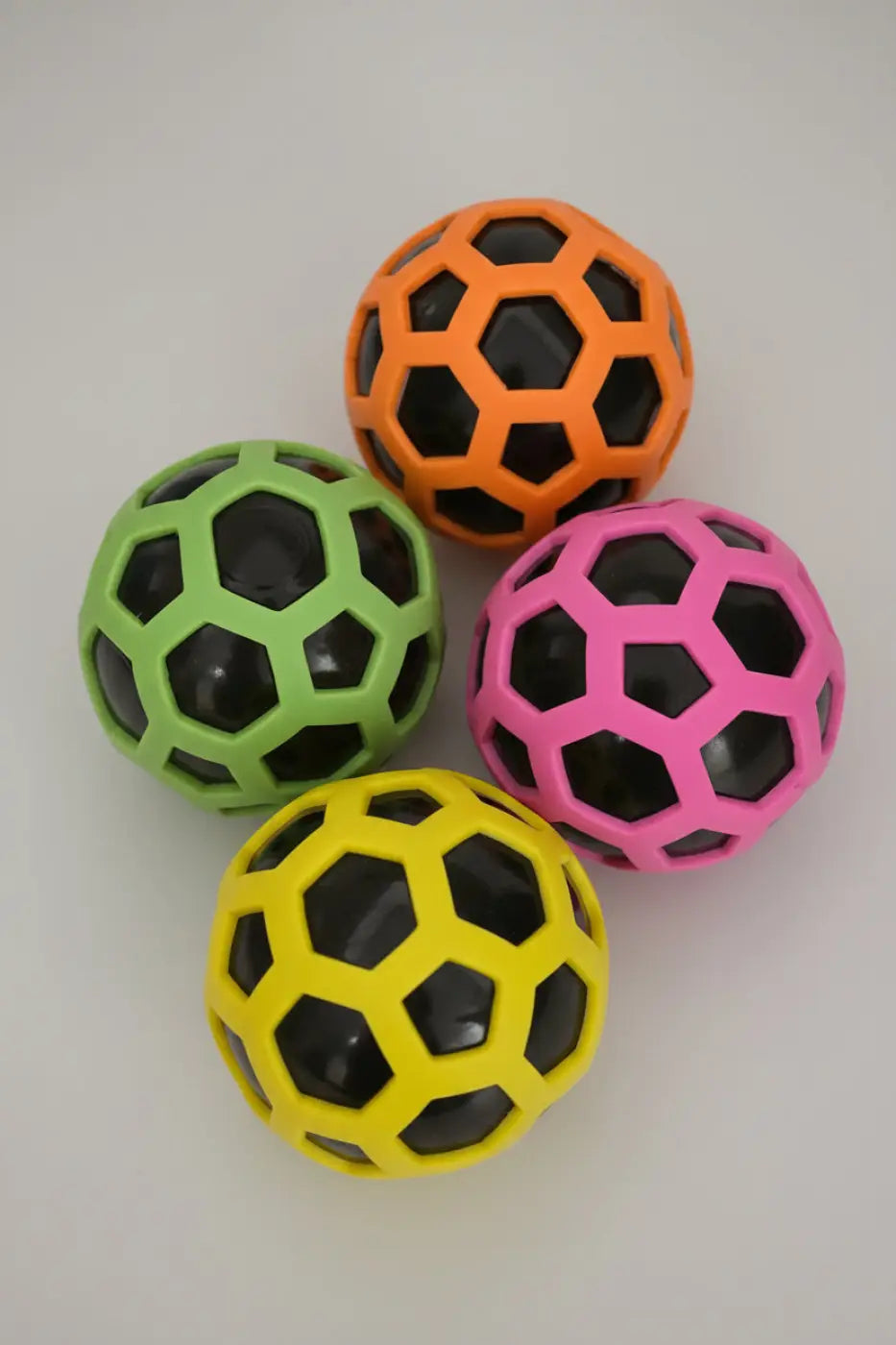 Puka Creations stress ball: Color Changing Hex-Mesh Squeezy Ball