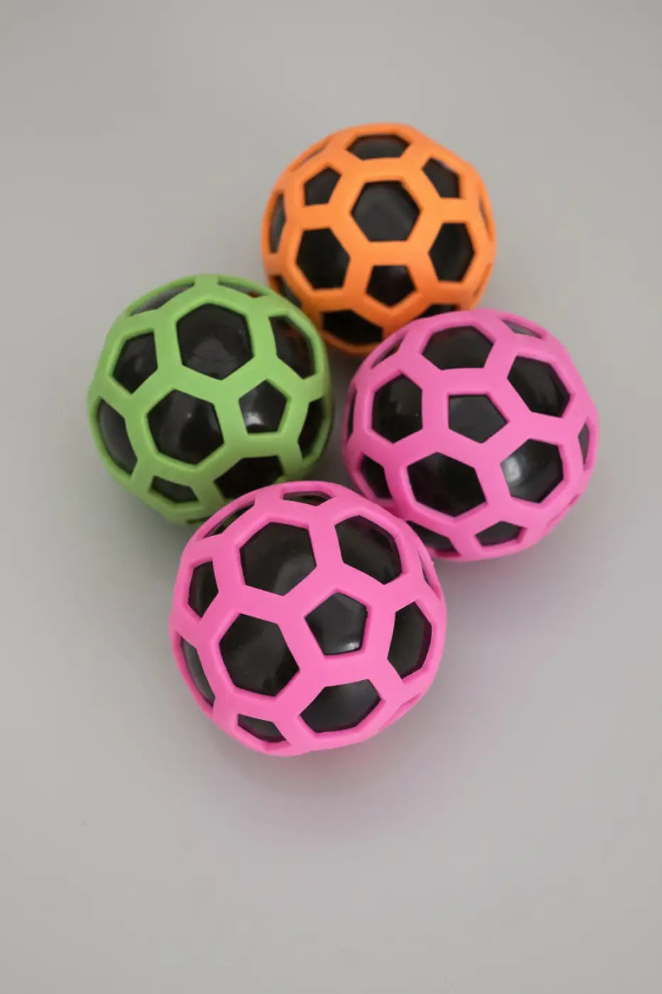 Puka Creations stress ball: Color Changing Hex-Mesh Squeezy Ball