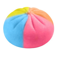 A colorful, round squishy toy with a soft, plush texture and vibrant sections of yellow, orange, pink, and blue.