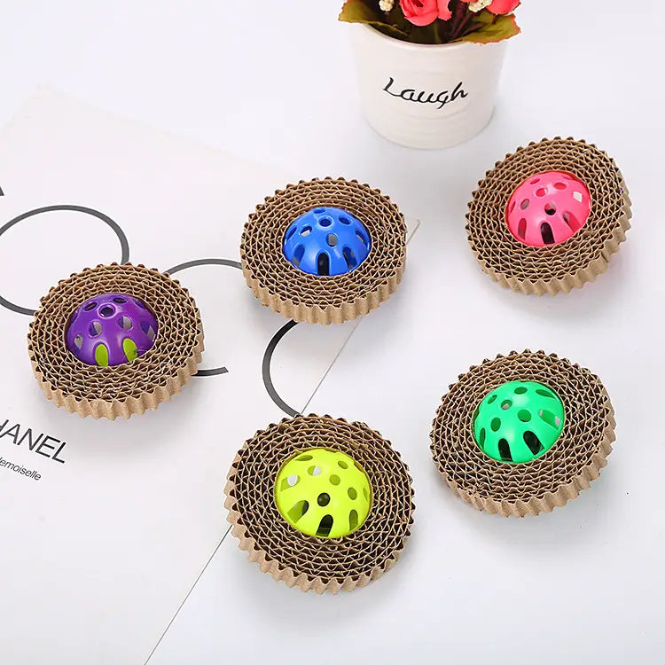Colorful plastic balls in corrugated cardboard bases for cat toy