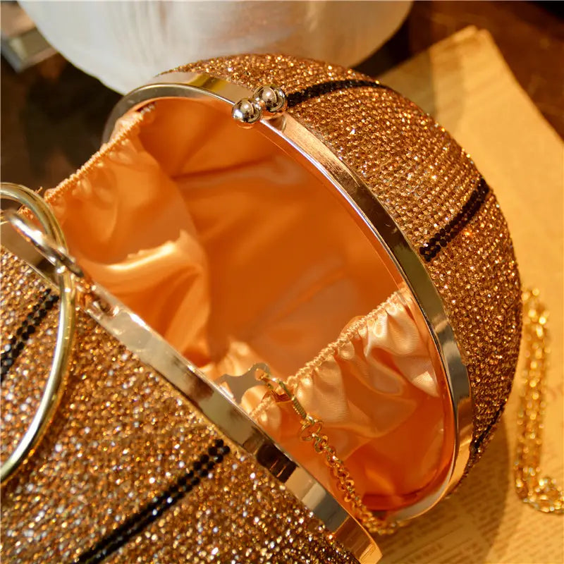 Ladies rhinestone basketball bag with gold glitter, black stripes, orange satin interior