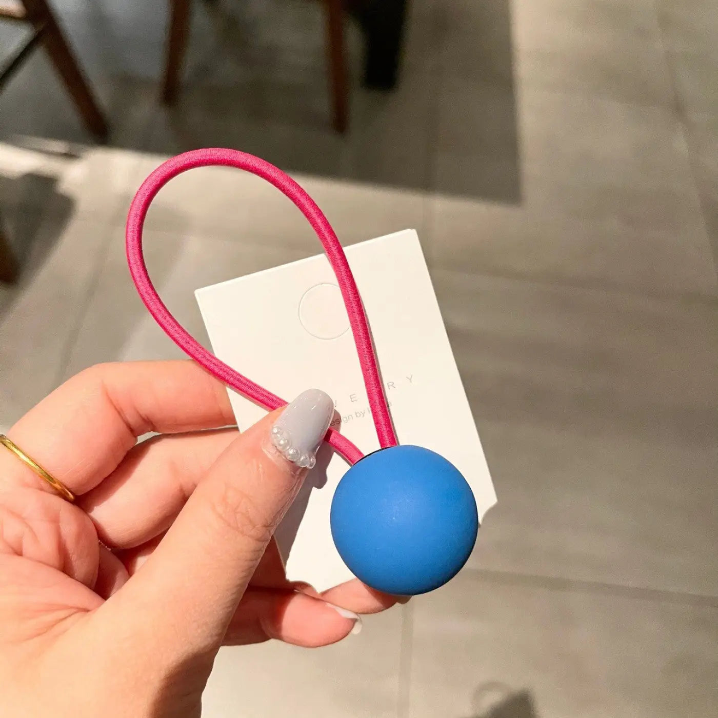 The Ball Depot novelty ball: Fluorescent Color Round Ball Hair Tie