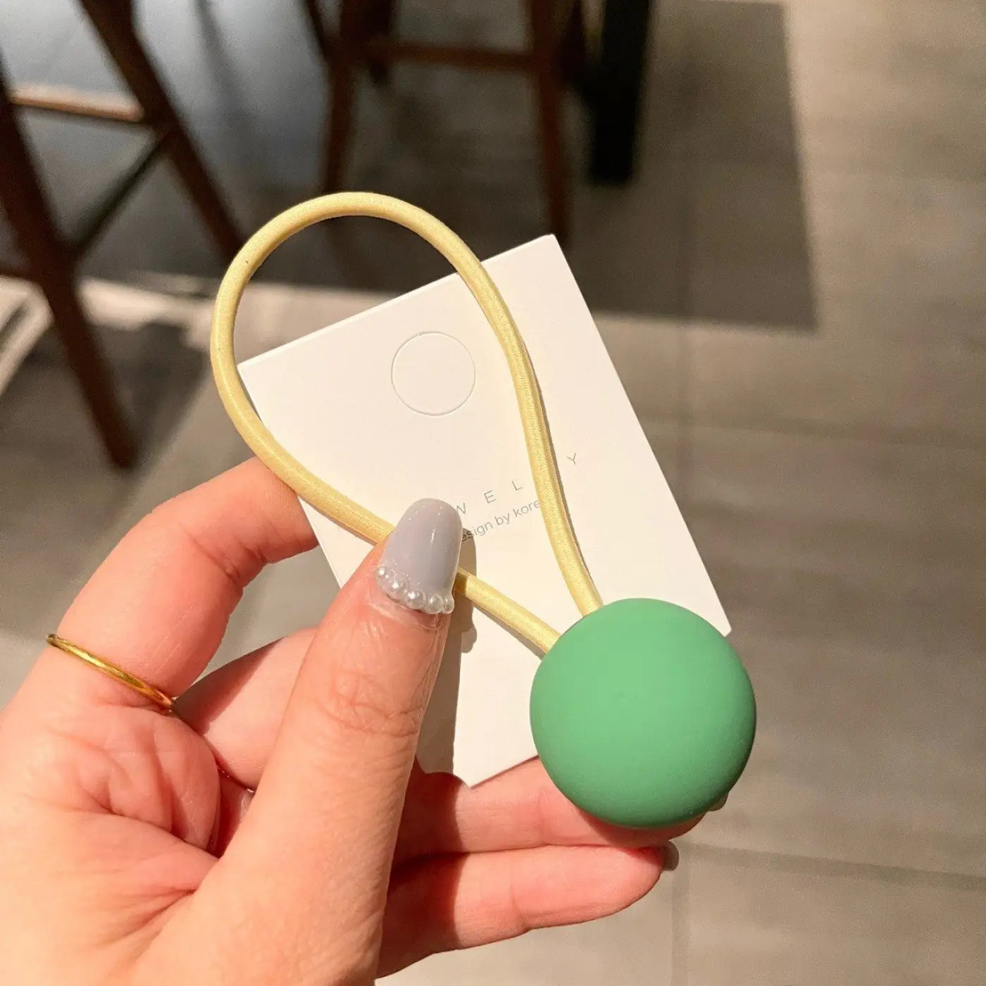 The Ball Depot novelty ball: Fluorescent Color Round Ball Hair Tie