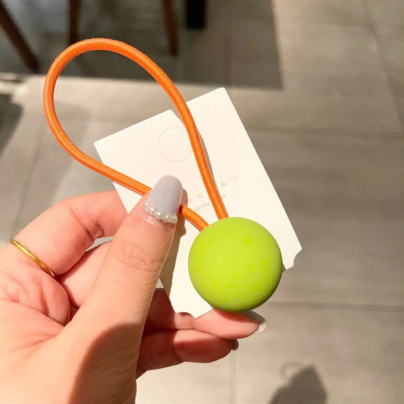 The Ball Depot novelty ball: Fluorescent Color Round Ball Hair Tie