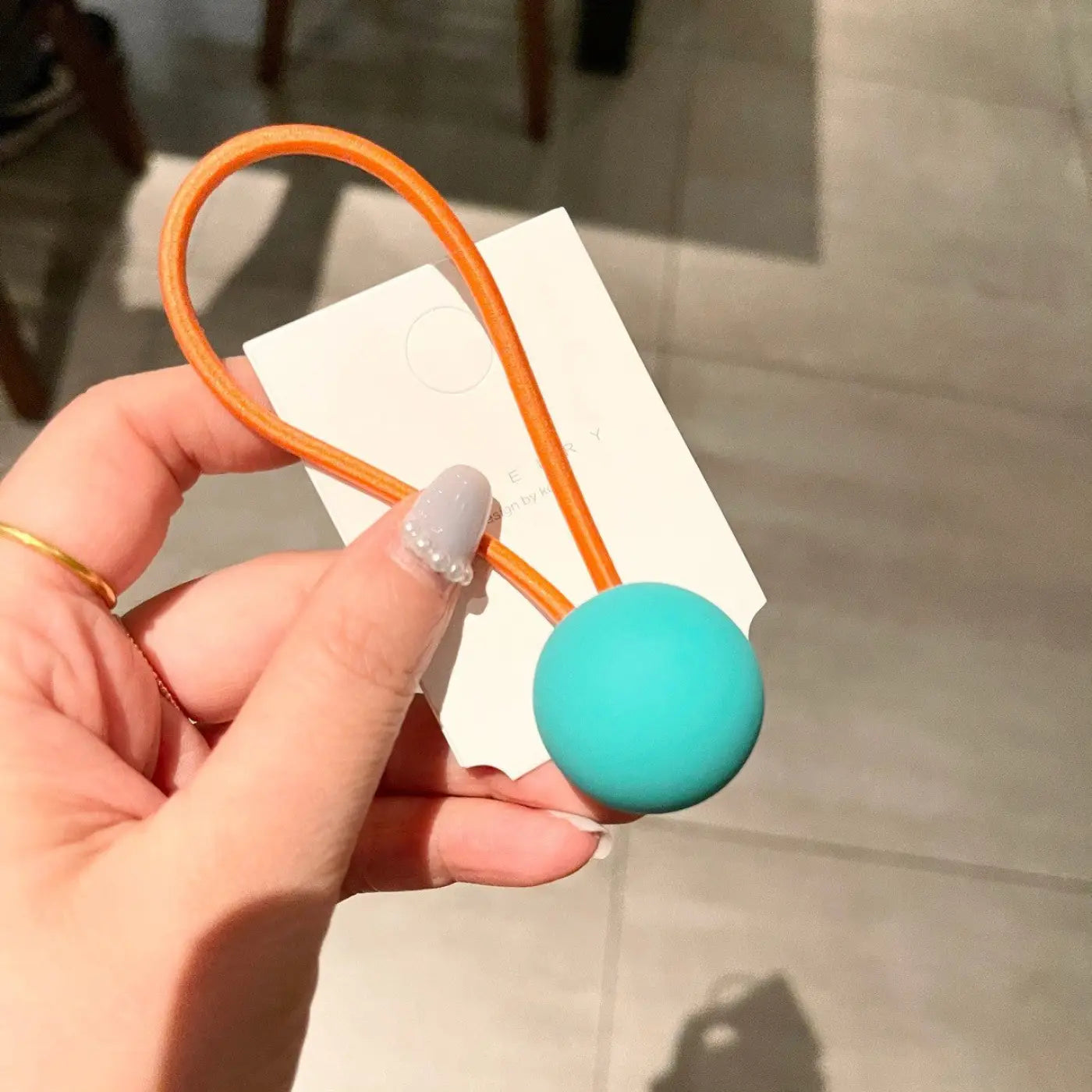 The Ball Depot novelty ball: Fluorescent Color Round Ball Hair Tie