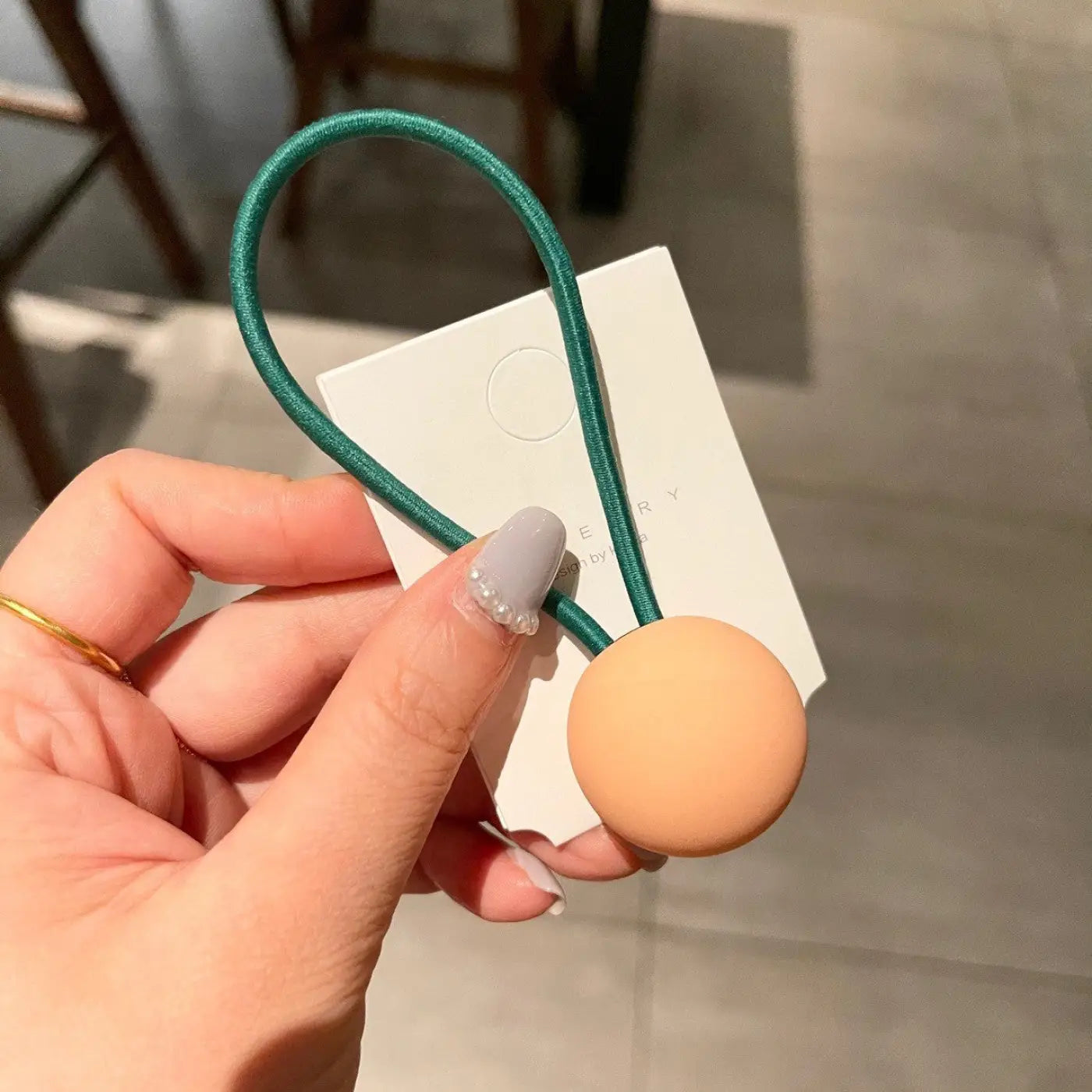 The Ball Depot novelty ball: Fluorescent Color Round Ball Hair Tie