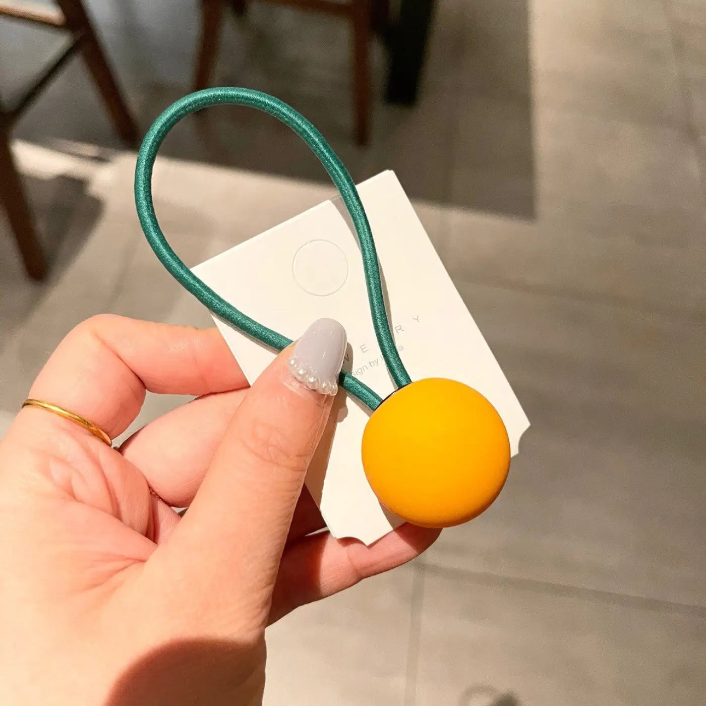 The Ball Depot novelty ball: Fluorescent Color Round Ball Hair Tie