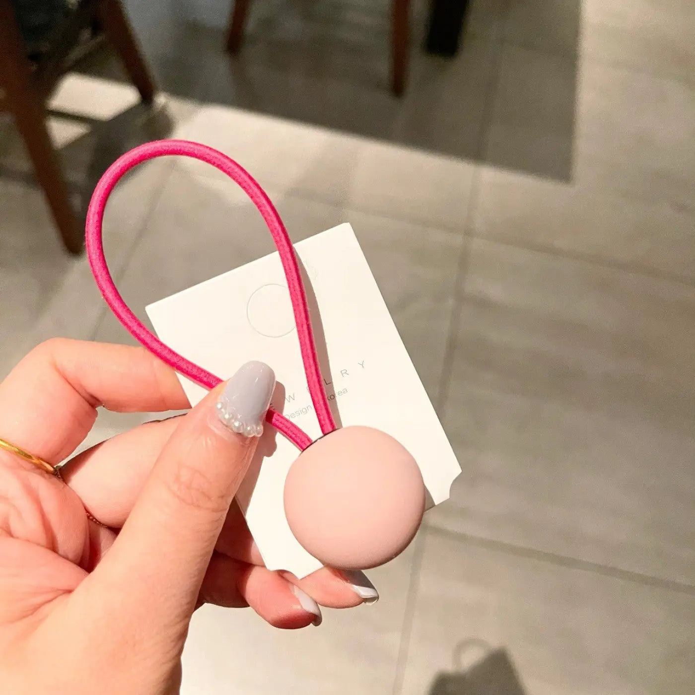 The Ball Depot novelty ball: Fluorescent Color Round Ball Hair Tie