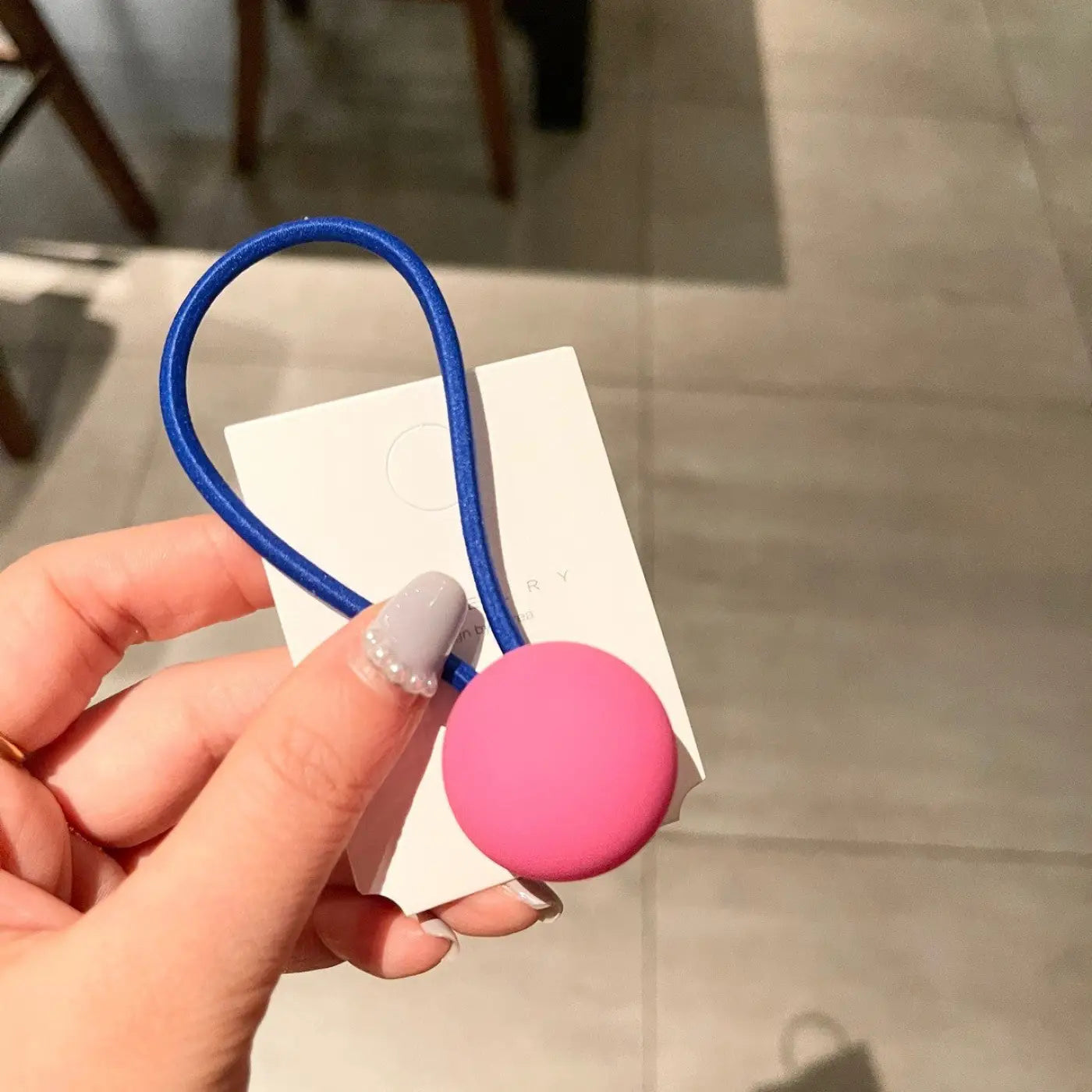 The Ball Depot novelty ball: Fluorescent Color Round Ball Hair Tie