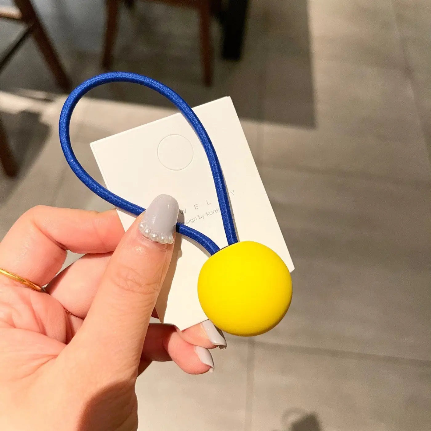 The Ball Depot novelty ball: Fluorescent Color Round Ball Hair Tie