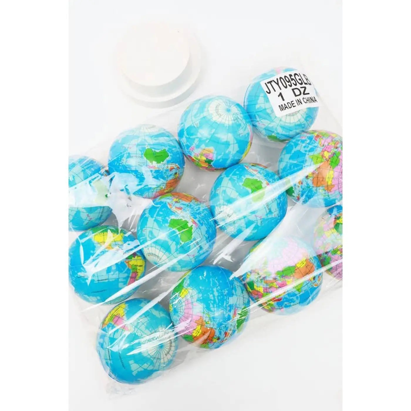 Love and Repeat stress ball: Globe Squeeze Balls