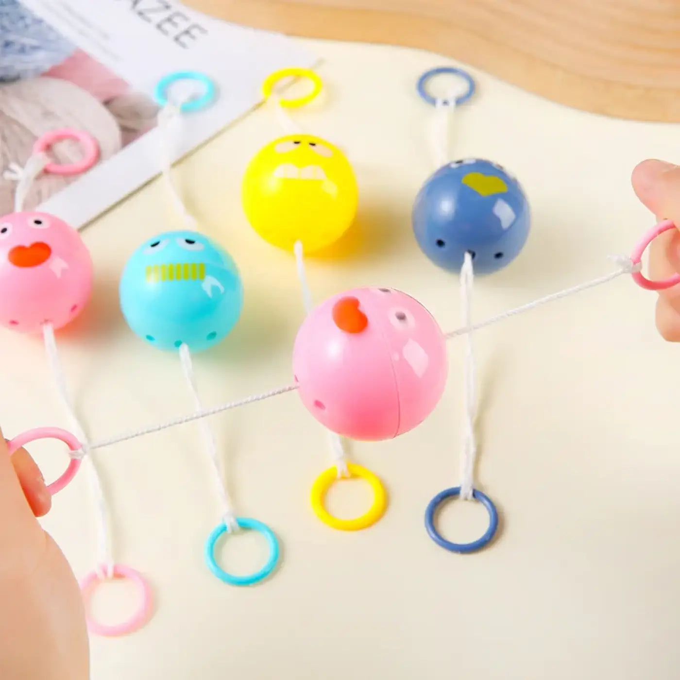 The Ball Depot kids game ball: Kids Rotating Flash Pull Ball