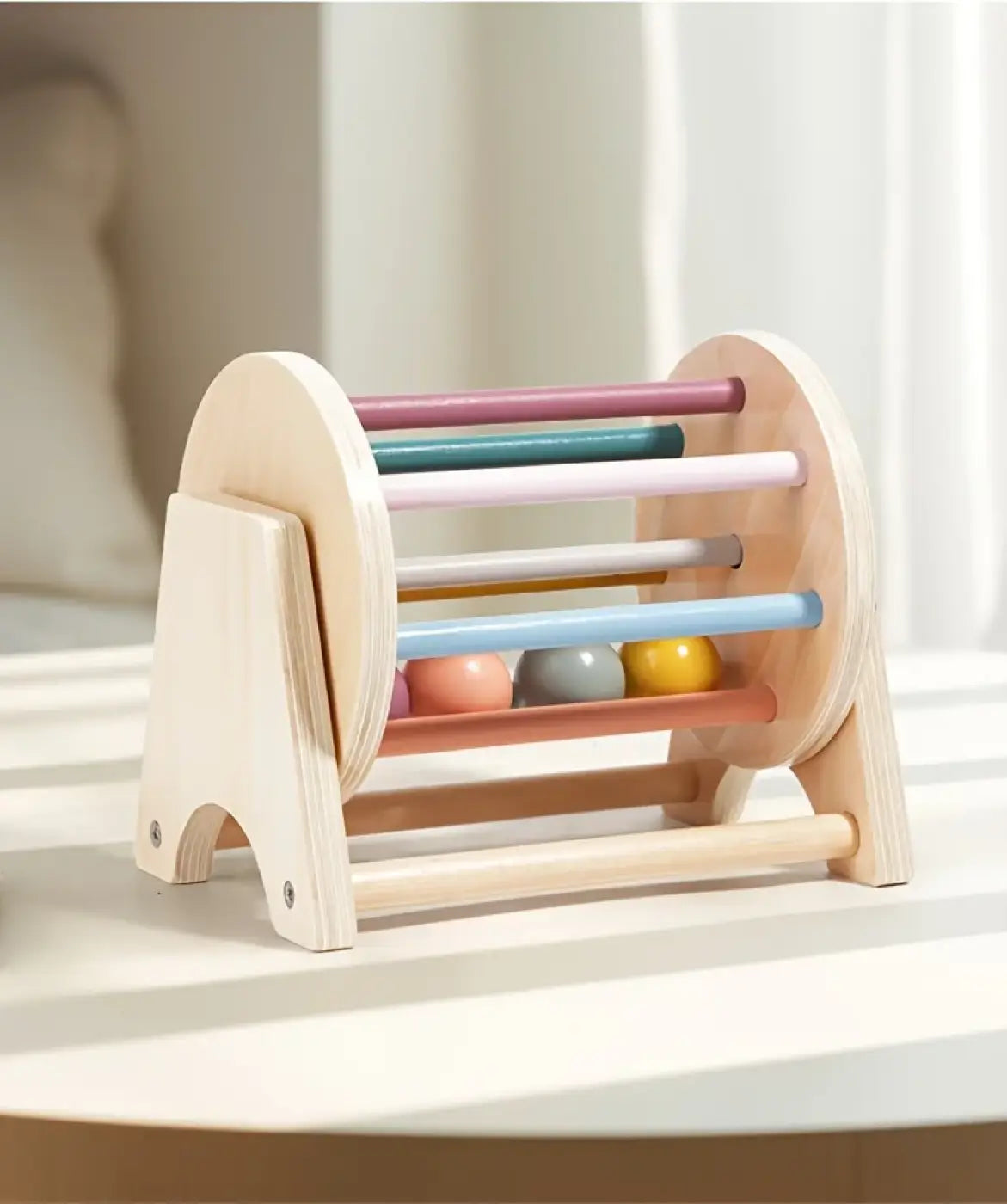 The Ball Depot musical drum ball set: Montessori Wooden Rolling Drum Set