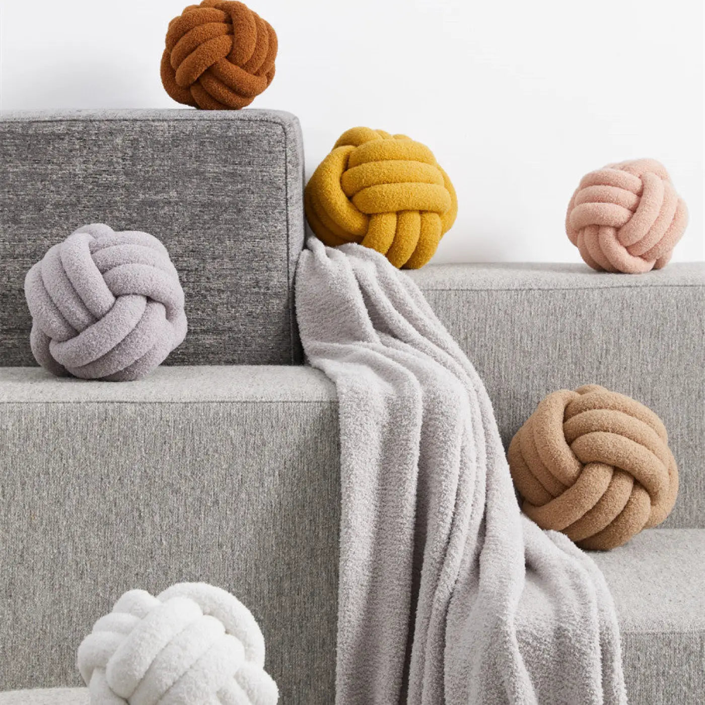 The Ball Depot ball pillow: Sofa Knotted Ball Pillow