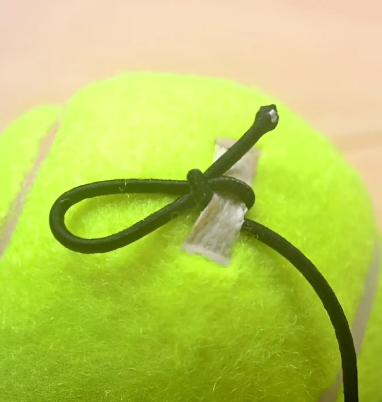 The Ball Depot tennis balls: Tennis Ball with String