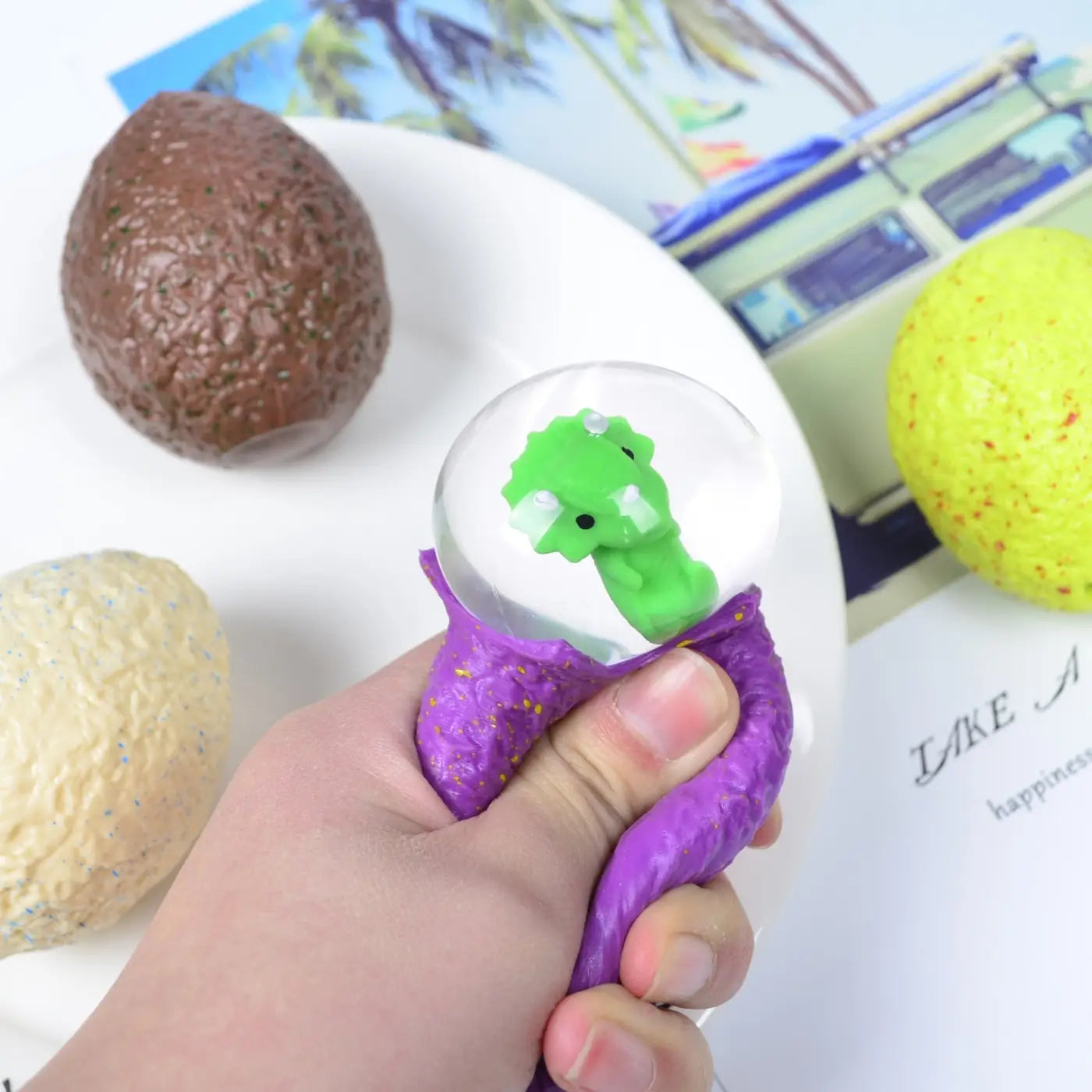 The Ball Depot sensory ball: Water Dino Egg Music Decompression Ball